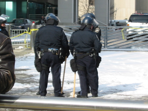 Cops with billy clubs