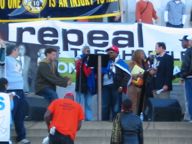 Speaker from Haiti (in red cap)